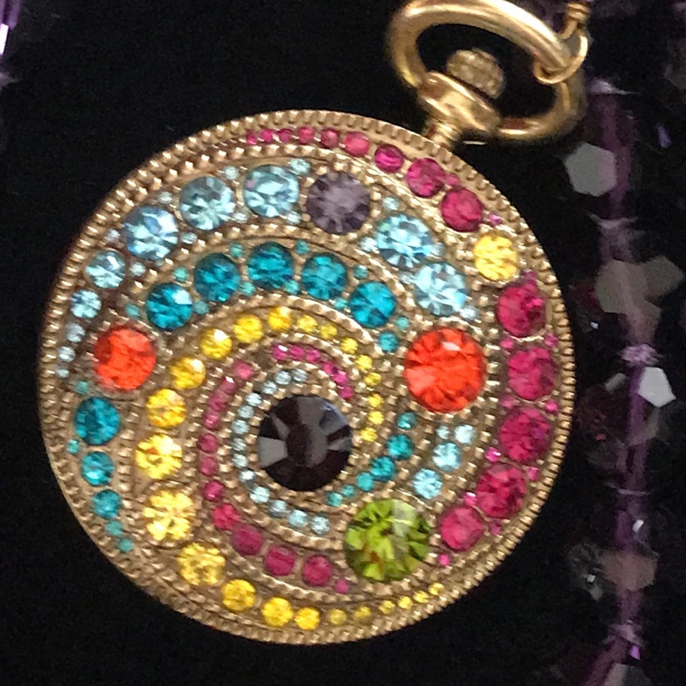 Heidi Daus, “Alice In Wonderland” pocket watch.